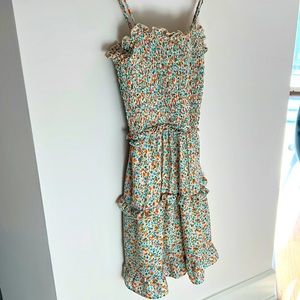 Jessica Simpson spaghetti strap spring dress with ruffle detail floral print.